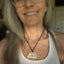 VOTE hand-stamped vintage spoon necklace worn on model showing pendant length and fit at neckline - upcycled silverware spoon necklace - handcrafted from upcycled vintage silverware - Laughing Frog Studio