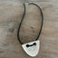 VOTE hand-stamped vintage spoon necklace on weathered wood showing full pendant and black faux suede cord with metal clasp - upcycled silverware spoon necklace - handcrafted from upcycled vintage silverware - Laughing Frog Studio