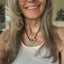 VOTE hand-stamped vintage spoon necklace worn on model showing pendant length and choker fit with black faux suede cord - upcycled silverware spoon necklace - handcrafted from upcycled vintage silverware - Laughing Frog Studio