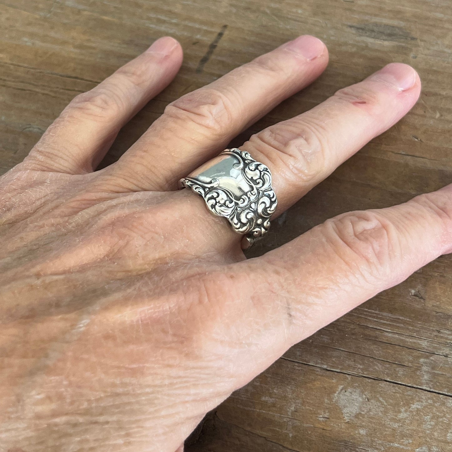 Vintage Imperial silverplate spoon ring shown on model - handcrafted from upcycled vintage silverware - Laughing Frog Studio