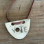 Close-up of hand-stamped VOTE spoon necklace pendant - silverplate spoon necklace - handcrafted from upcycled vintage silverware - Laughing Frog Studio