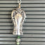 Daybreak pattern knife bell pendant with spring green beads detail - handcrafted from upcycled vintage silverware - Laughing Frog Studio