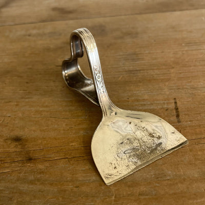 Ergonomic heart handle spoon cheese knife in Queen Bess II pattern - back view showing vintage patina and wear - handcrafted from upcycled vintage silverware - Laughing Frog Studio