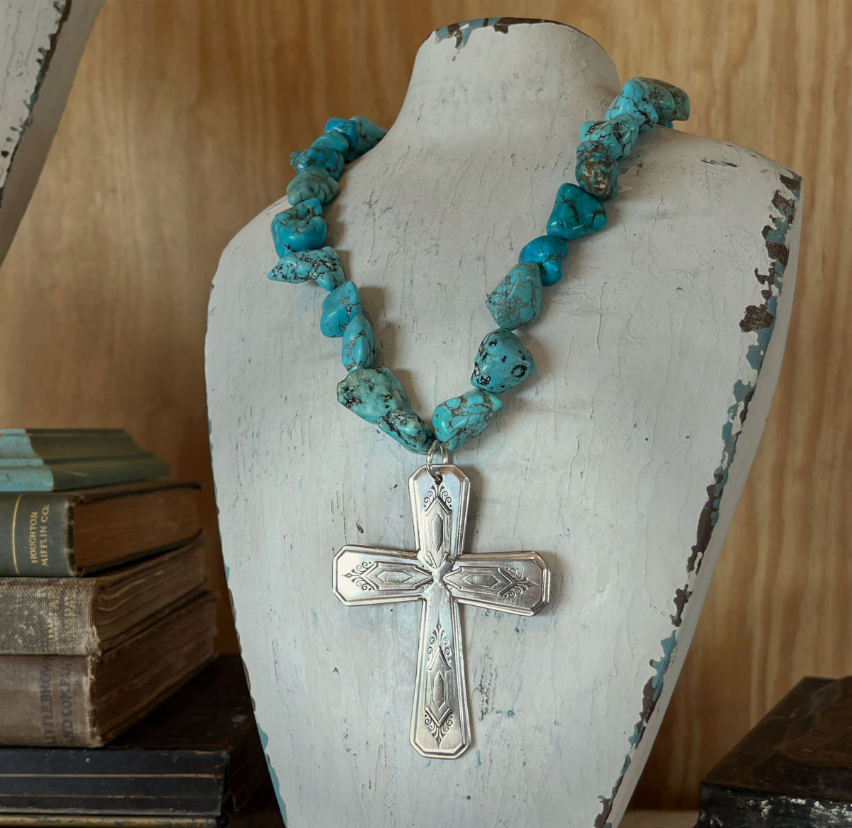 NUART cross with chunky turquoise howlite beads on a white display bust - Spoon cross necklace - handcrafted from upcycled vintage silverware - Laughing Frog Studio