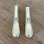Close-up of handcrafted 1847 Rogers Adoration knife vase showing polished hollow handle and decorative pattern