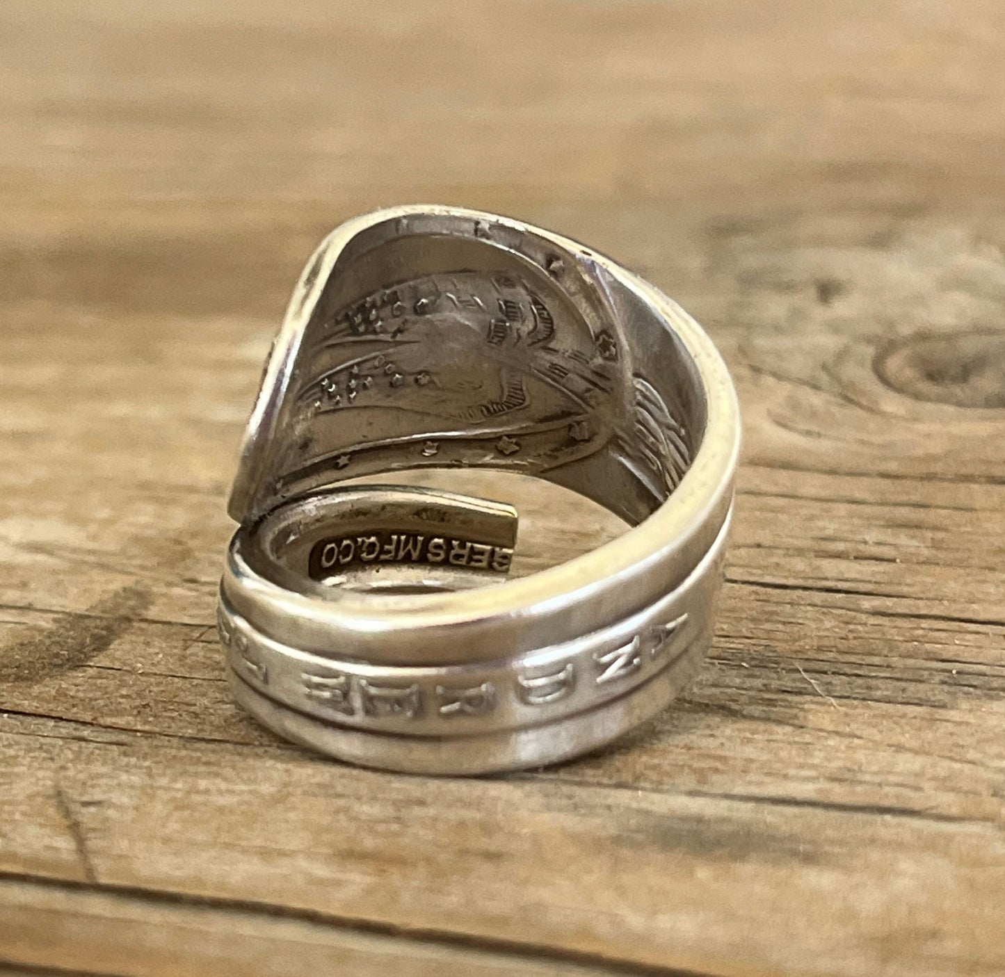 Inside view of Andrew Jackson presidential spoon ring highlighting vintage silverware detail