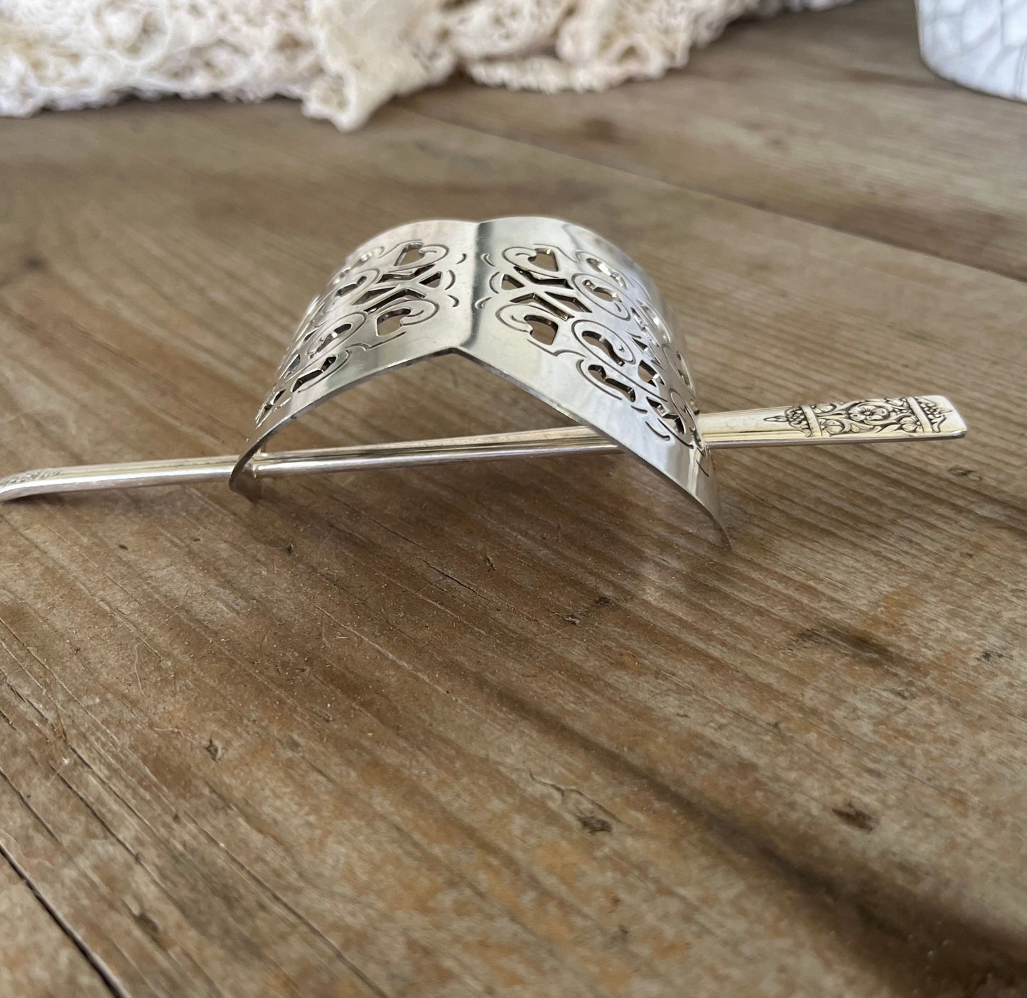 Upcycled Danish cake server barrette profile displaying half-moon design