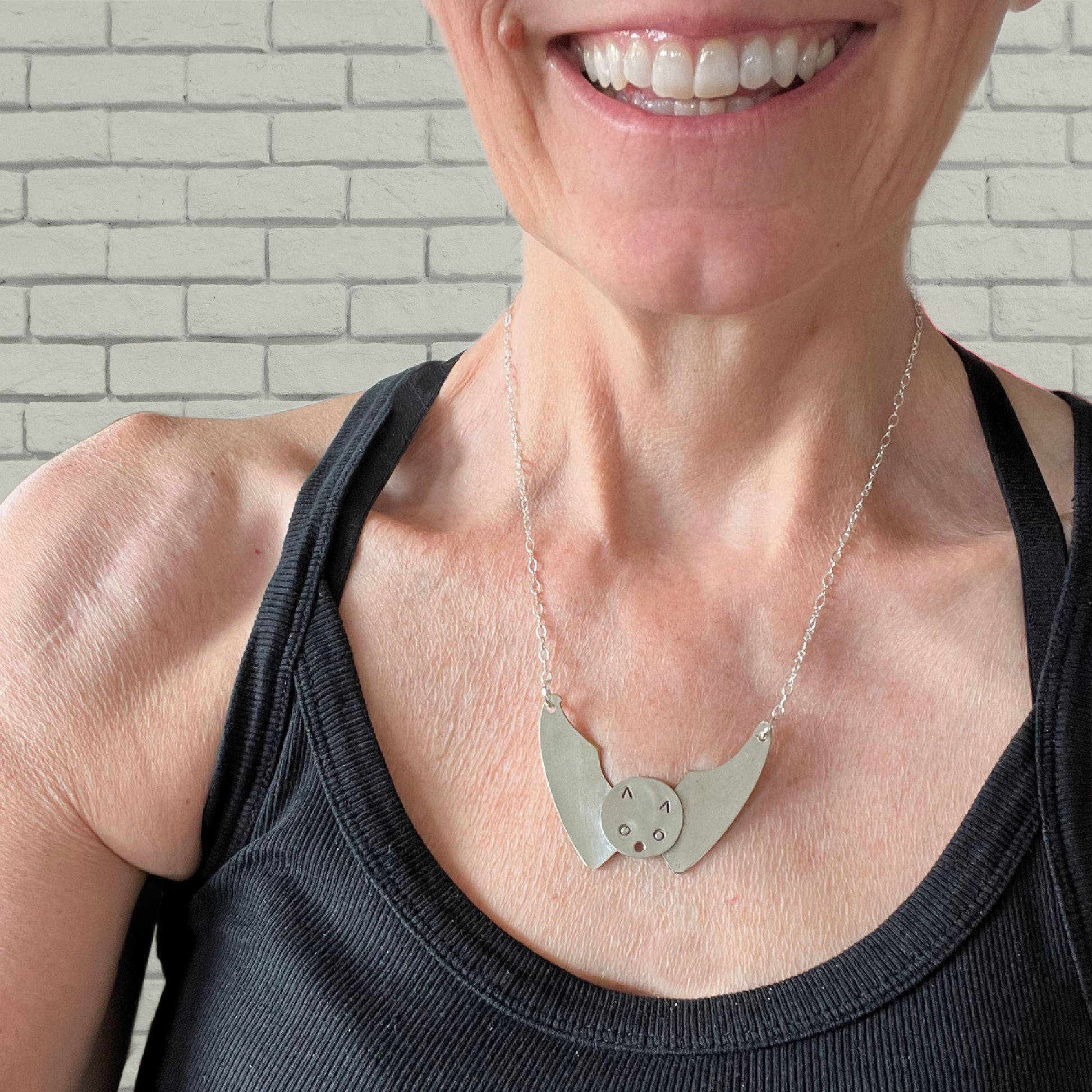 Handcrafted bat necklace made from vintage spoon bowls - premium artisan upcycled silverware Halloween jewelry