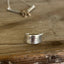 Close-up of TORONTO CANADA pattern silverware ring showing iconic Canadian design detail
