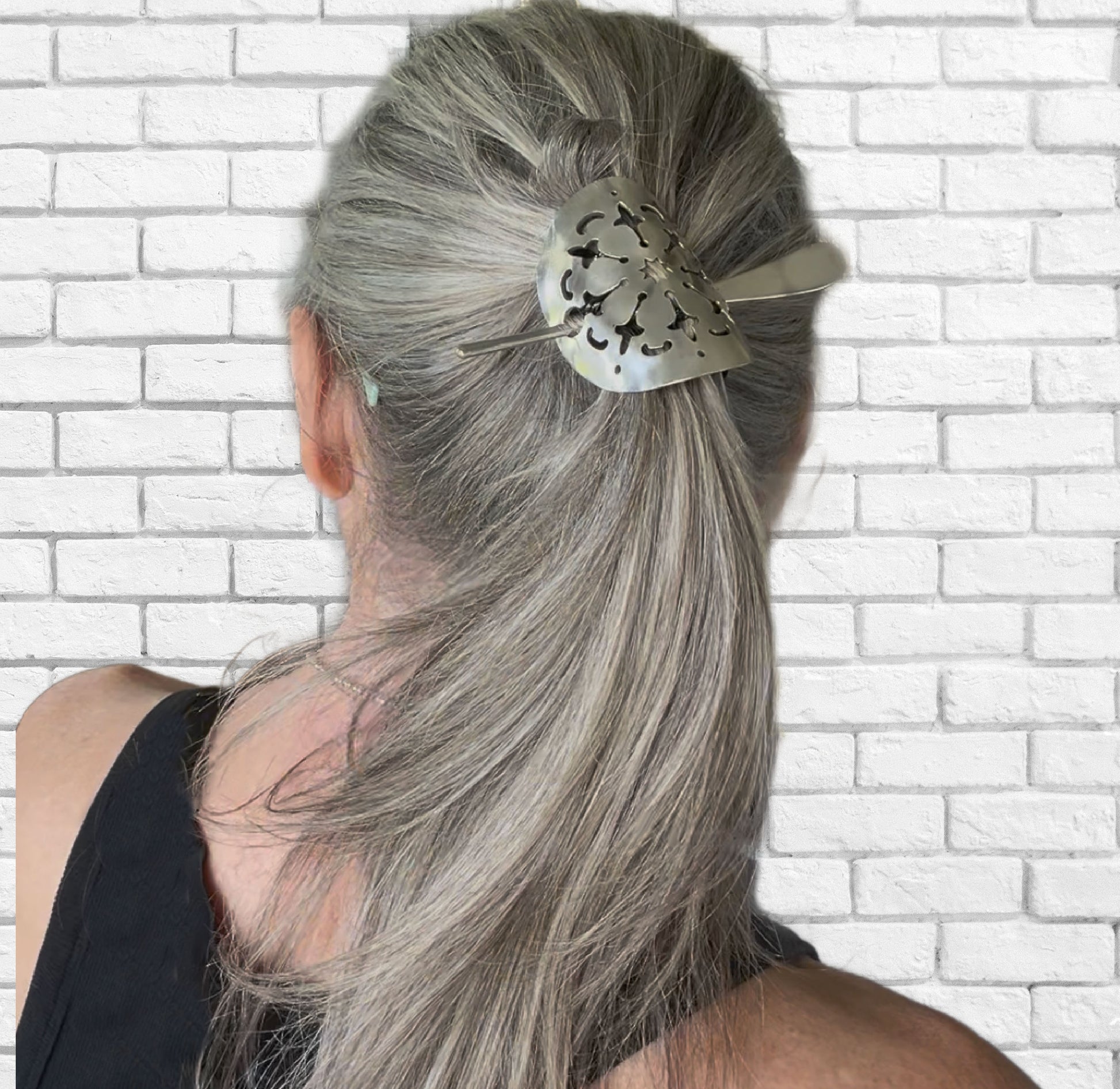 Top view of vintage cake server ponytail barrette worn in hair - handcrafted from upcycled silverware - Laughing Frog Studio