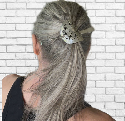 Top view of vintage cake server ponytail barrette worn in hair - handcrafted from upcycled silverware - Laughing Frog Studio