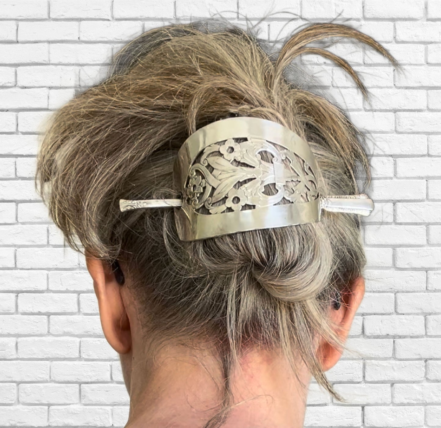 Art Deco cake server hair barrette handcrafted from vintage silverware with floral vase design and Treasure stick shown in hair 