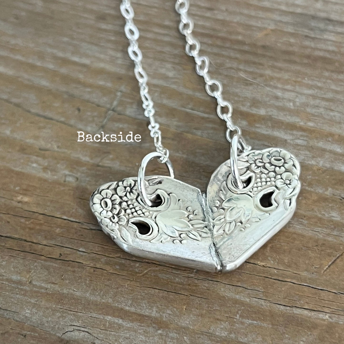 Back view of Lovely Lady heart pendant necklace showing silverplate loop chain attachment, handmade upcycled fork jewelry 