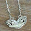 Vintage silverware heart necklace made from upcycled 1937 Lovely Lady pattern by Holmes & Edwards, handcrafted floral openwork pendant