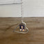 Detail view of handmade floating heart necklace showing moveable ring attachment, one-of-a-kind vintage silverware jewelry