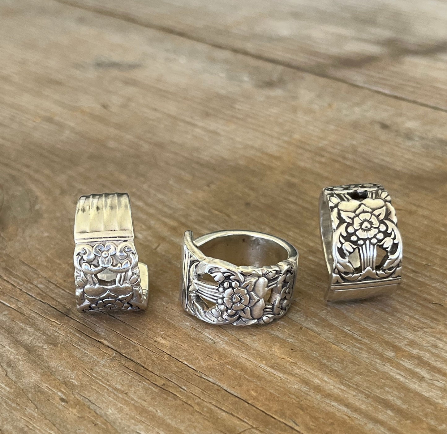 Trio of CORONATION pattern spoon rings displaying unique upcycled silverware design