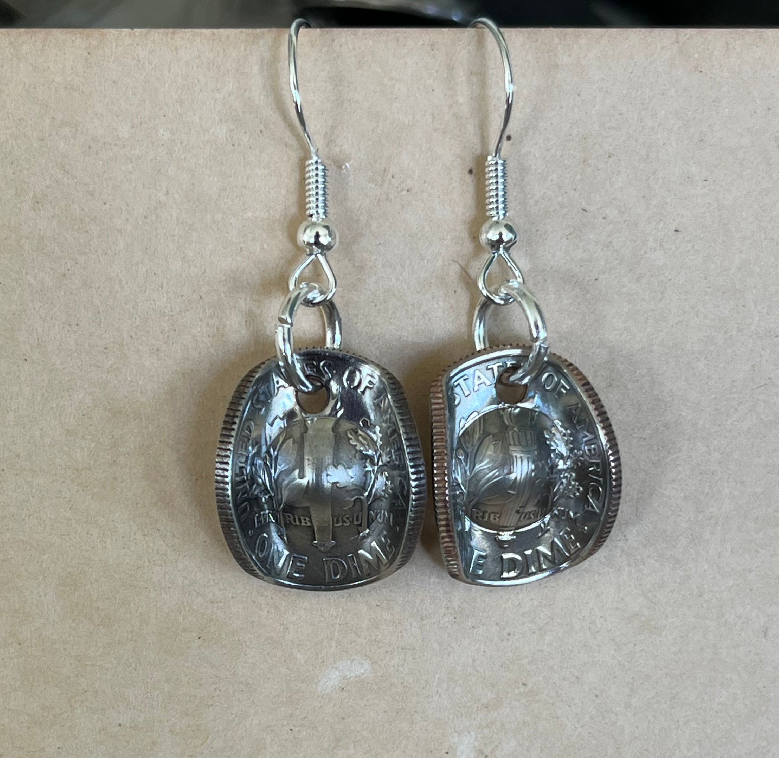 Handcrafted cowgirl hat earrings made from real U.S. Roosevelt dimes showing Western charm and coin detail