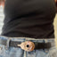 Close-up of guitar spoon belt buckle on leather snap belt with vintage Levi's - upcycled silverware accessory - Laughing Frog Studio