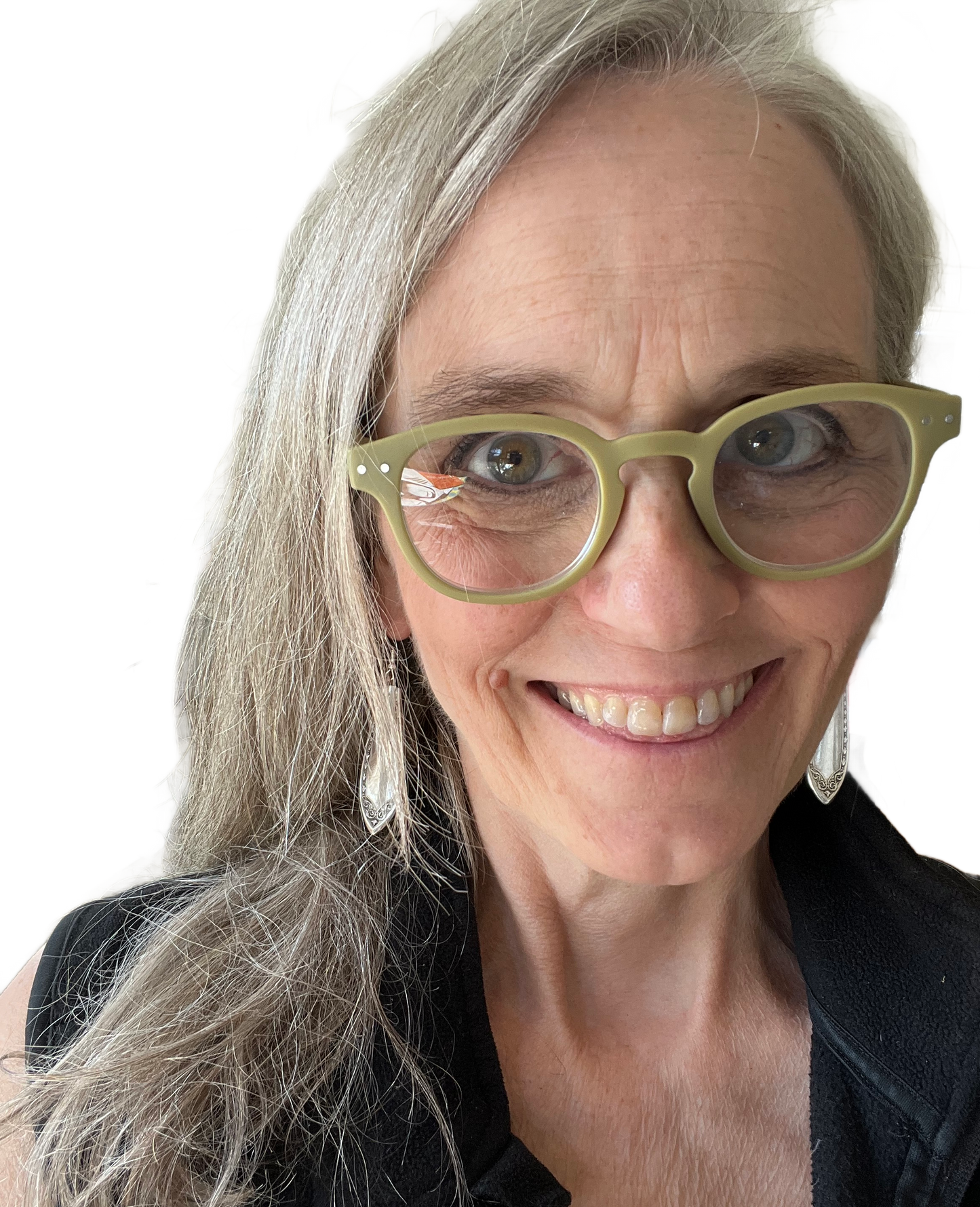 Jen Edmondson, owner of Laughing Frog Studio, wearing Sheraton spoon earrings handcrafted from upcycled vintage silverware