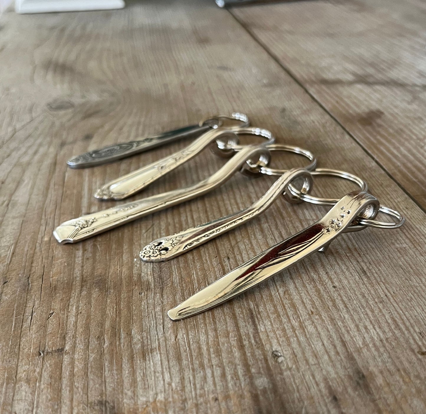 Vintage spoon handle keychain collection handcrafted from upcycled antique silverware various patterns