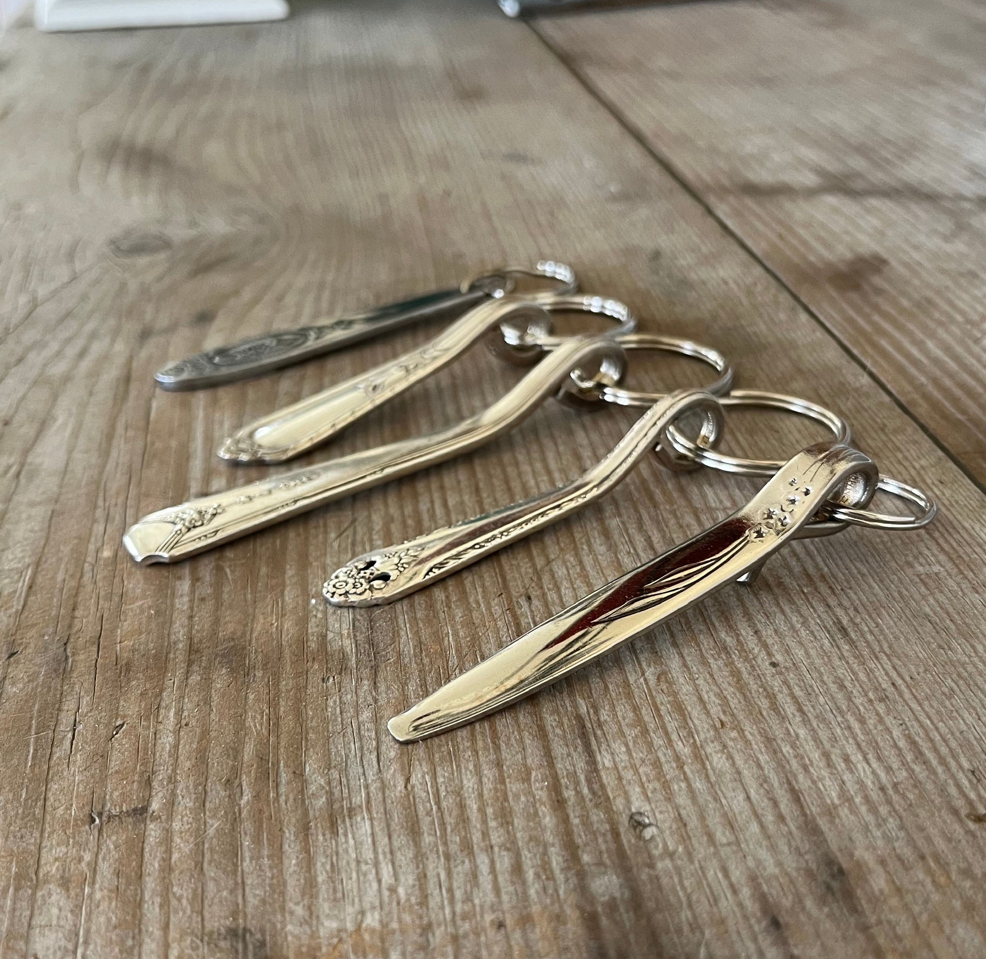 Vintage spoon handle keychain collection handcrafted from upcycled antique silverware various patterns
