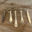 Upcycled vintage silverware spoon handle keychains alternate view showing handcrafted pattern details