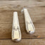 Close-up of handcrafted 1938 William Rogers Talisman knife vase showing polished hollow handle and decorative art deco pattern