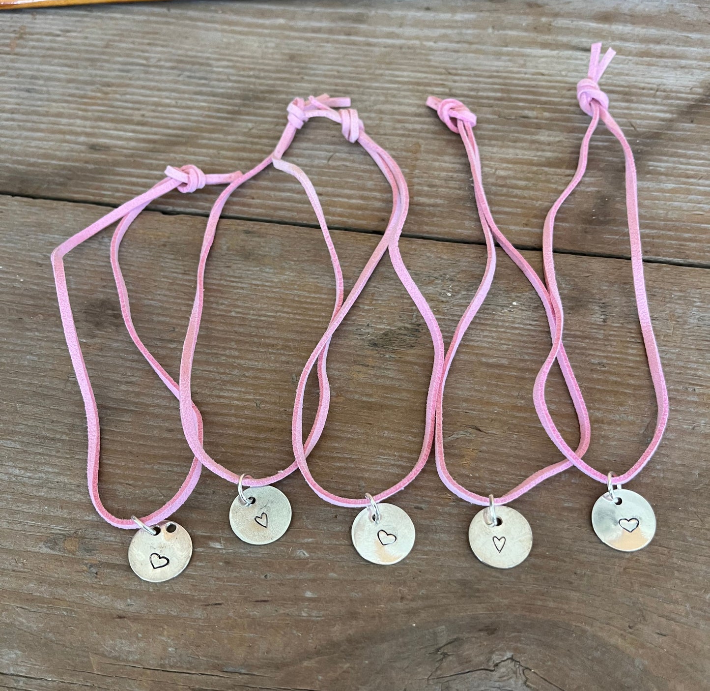 Heart stamped circle pendant spoon necklace on leather cord - handcrafted artisan silverware jewelry