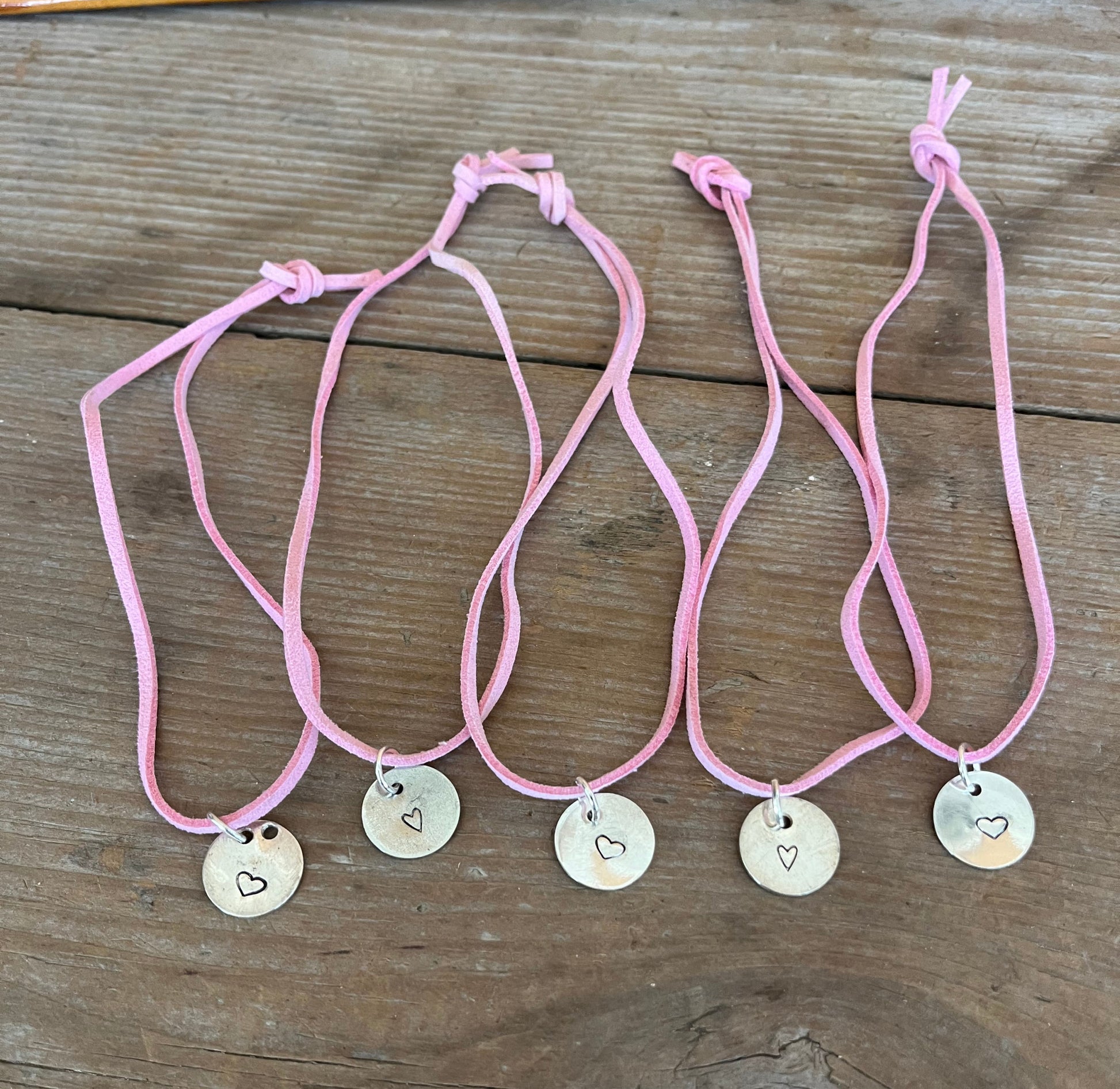 Heart stamped circle pendant spoon necklace on leather cord - handcrafted artisan silverware jewelry