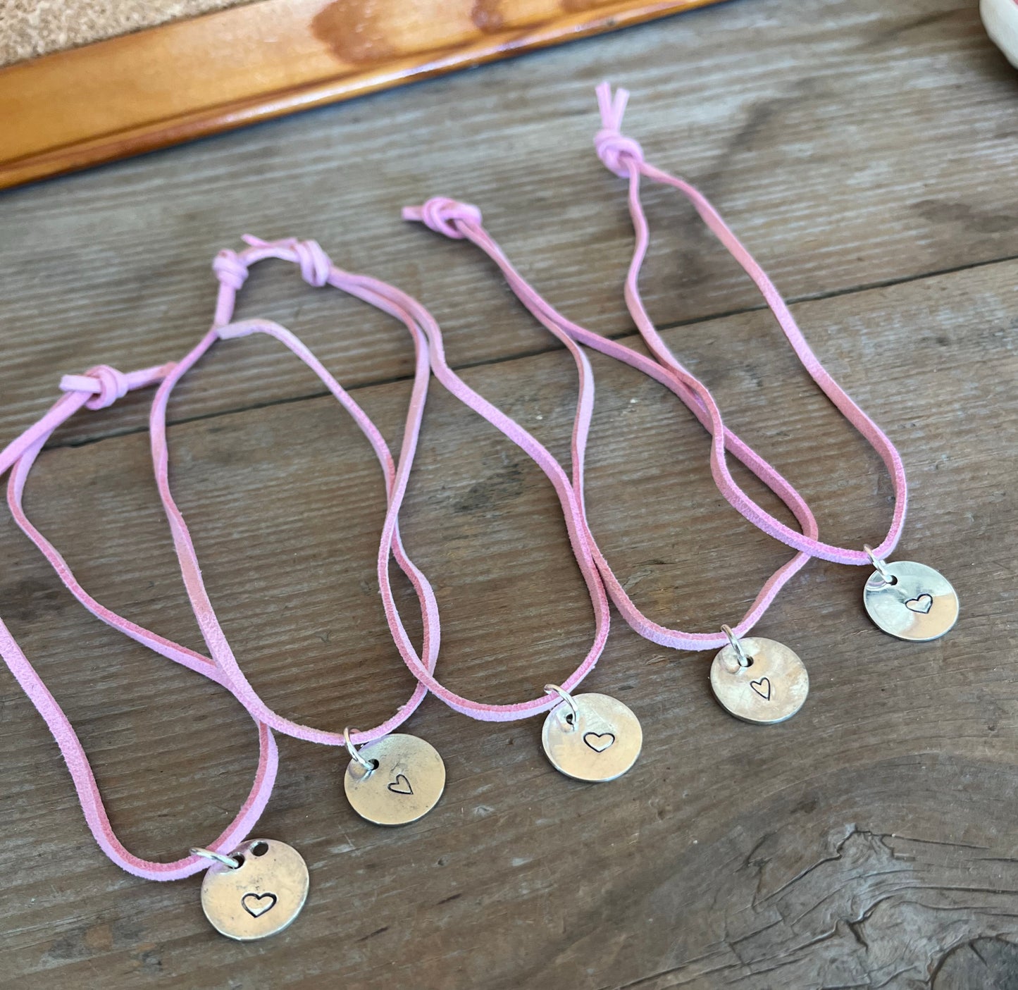 Heart stamped spoon circle pendant on leather choker - unique artisan jewelry