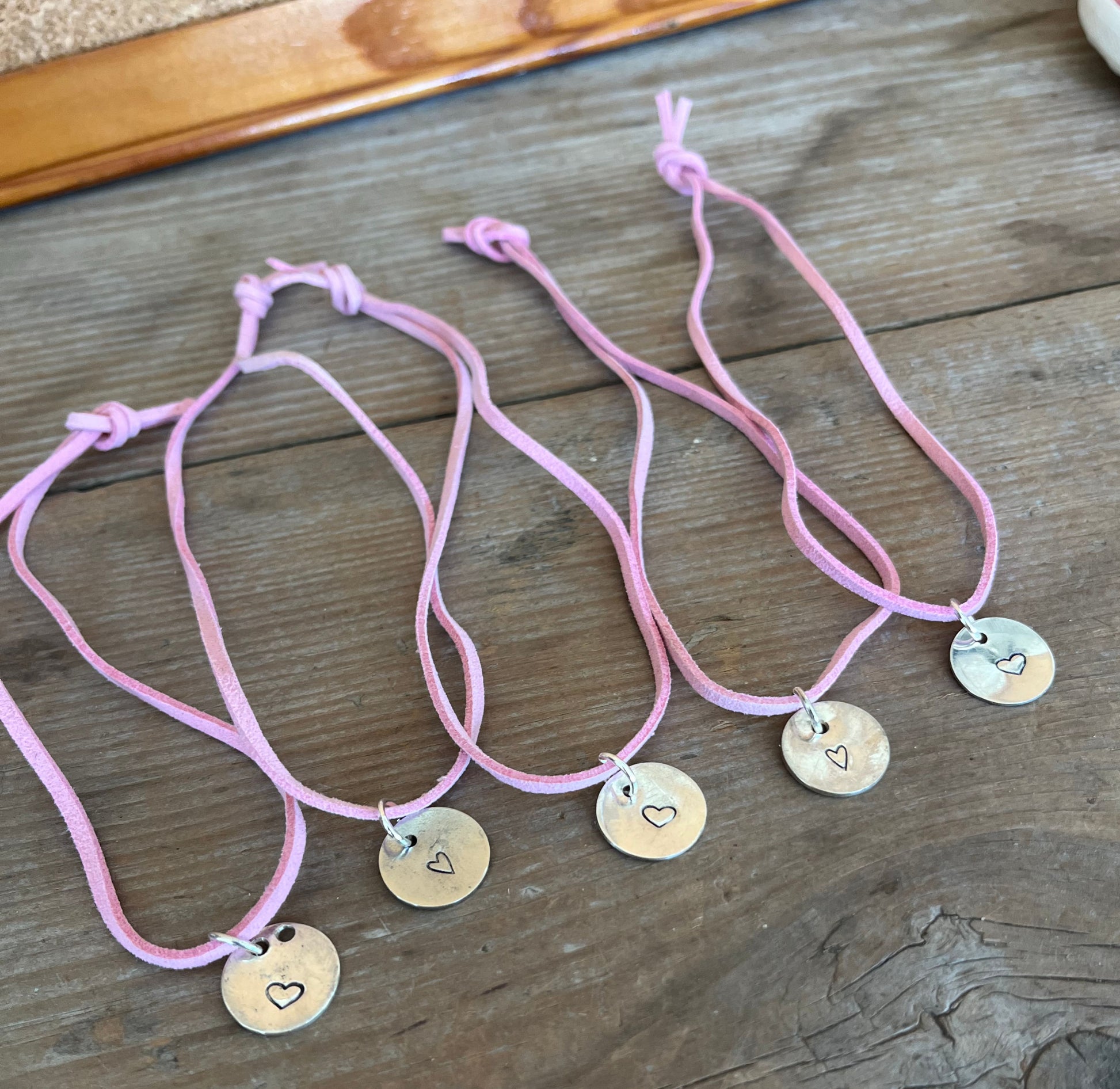 Heart stamped spoon circle pendant on leather choker - unique artisan jewelry