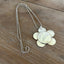 Close up view of vintage silverplate daisy spoon necklace on ball chain - Spoon Necklace - handcrafted from upcycled vintage silverware - Laughing Frog Studio