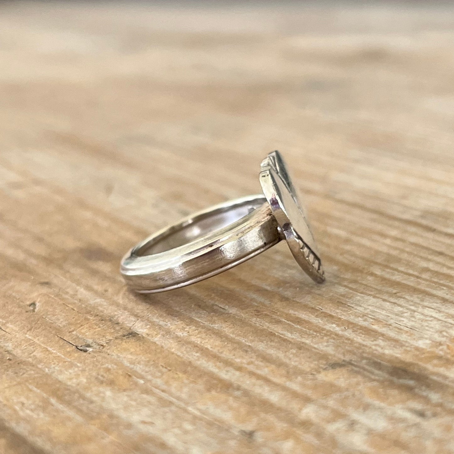 Side view of shank on Handmade heart spoon ring crafted from upcycled mid-century silverplate silverware, size 9