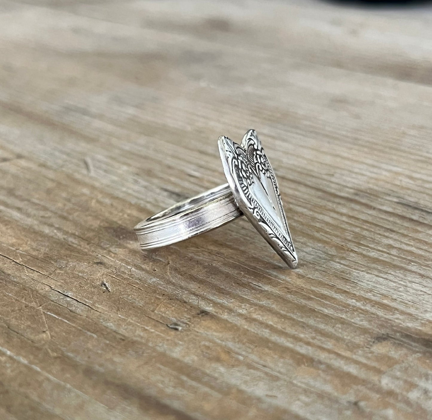 Heart spoon ring showing scrap-bin spoon neck shank and William Rogers Cotillion pattern from 1937