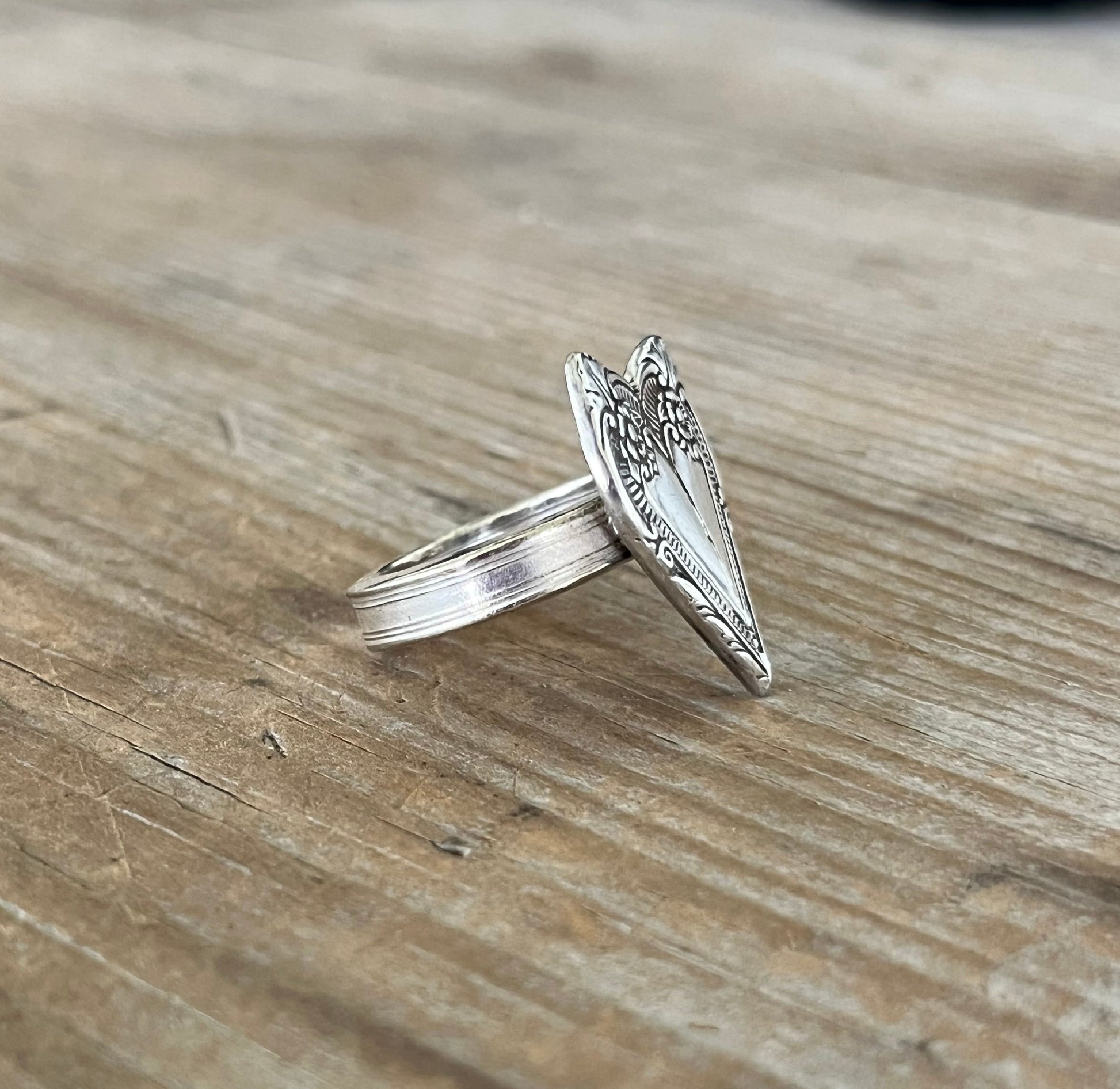Heart spoon ring showing scrap-bin spoon neck shank and William Rogers Cotillion pattern from 1937