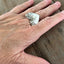 Exquisite heart ring shown on hand - romantic handcrafted upcycled silverware jewelry