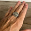 INTERLUDE spoon ring worn on finger displaying size and fit of upcycled silverware ring