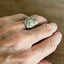 Victorian scrollwork Oxford spoon ring shown on hand - handcrafted from upcycled vintage silverware - Laughing Frog Studio