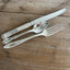 Custom hand-stamped silverware set with vintage mismatched fork knife and spoon - personalized tableware