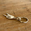 Upcycled fork peace sign keychain side 
view - handcrafted from upcycled vintage silverware - Laughing Frog Studio
