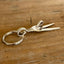 Vintage silverplate peace sign fork keychain detail showing tine design - handcrafted from upcycled vintage silverware - Laughing Frog Studio