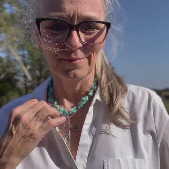 Owner, Jennifer Edmondson wearing Nobility plate Caprice pattern silverware cross necklace on turquoise howlite stone bead choker - handcrafted upcycled vintage silverware jewelry - Laughing Frog Studio