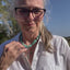 Owner, Jennifer Edmondson wearing Nobility plate Caprice pattern silverware cross necklace on turquoise howlite stone bead choker - handcrafted upcycled vintage silverware jewelry - Laughing Frog Studio