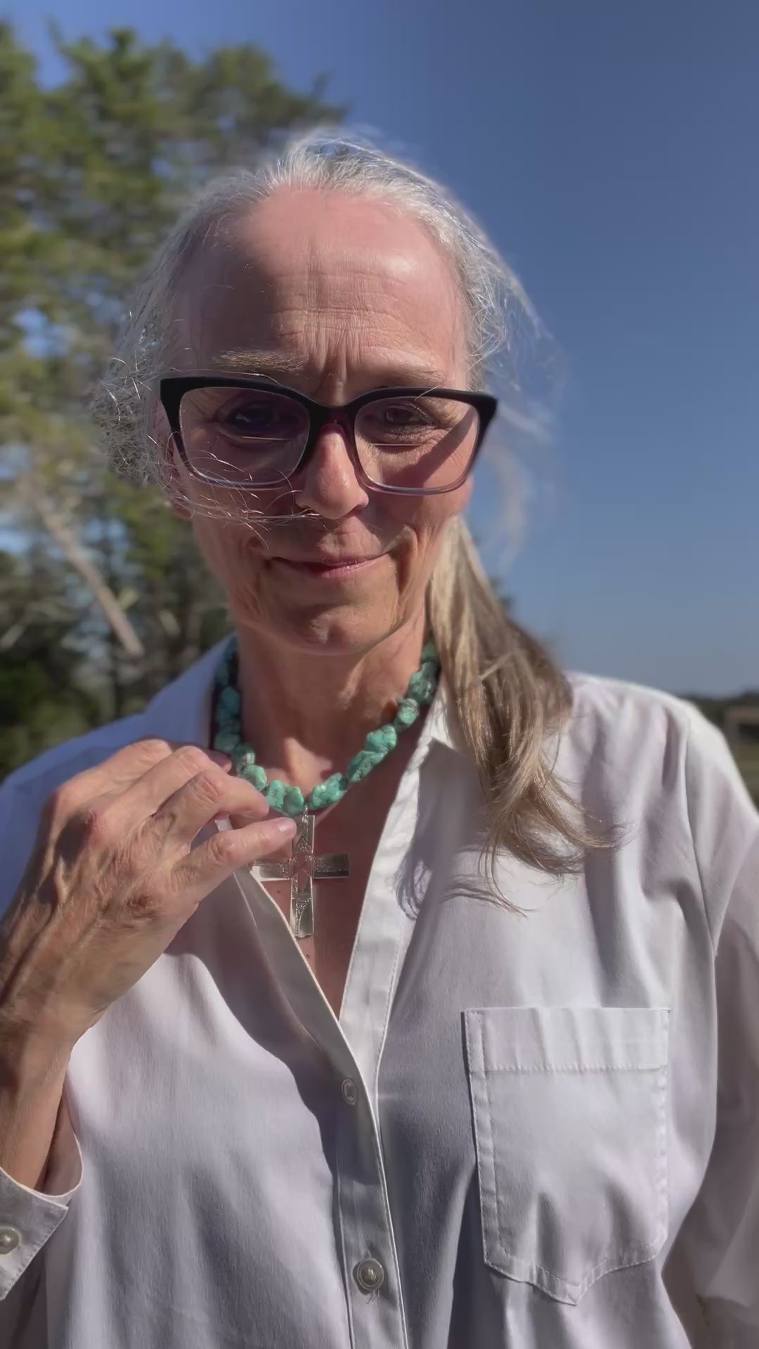 Owner, Jennifer Edmondson wearing Nobility plate Caprice pattern silverware cross necklace on turquoise howlite stone bead choker - handcrafted upcycled vintage silverware jewelry - Laughing Frog Studio