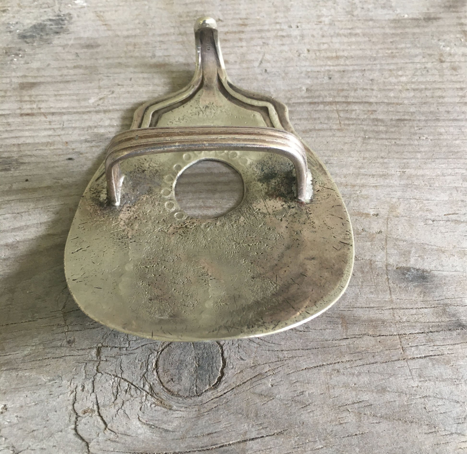 Back side of Upcycled Spoon Guitar Shaped Belt Buckle