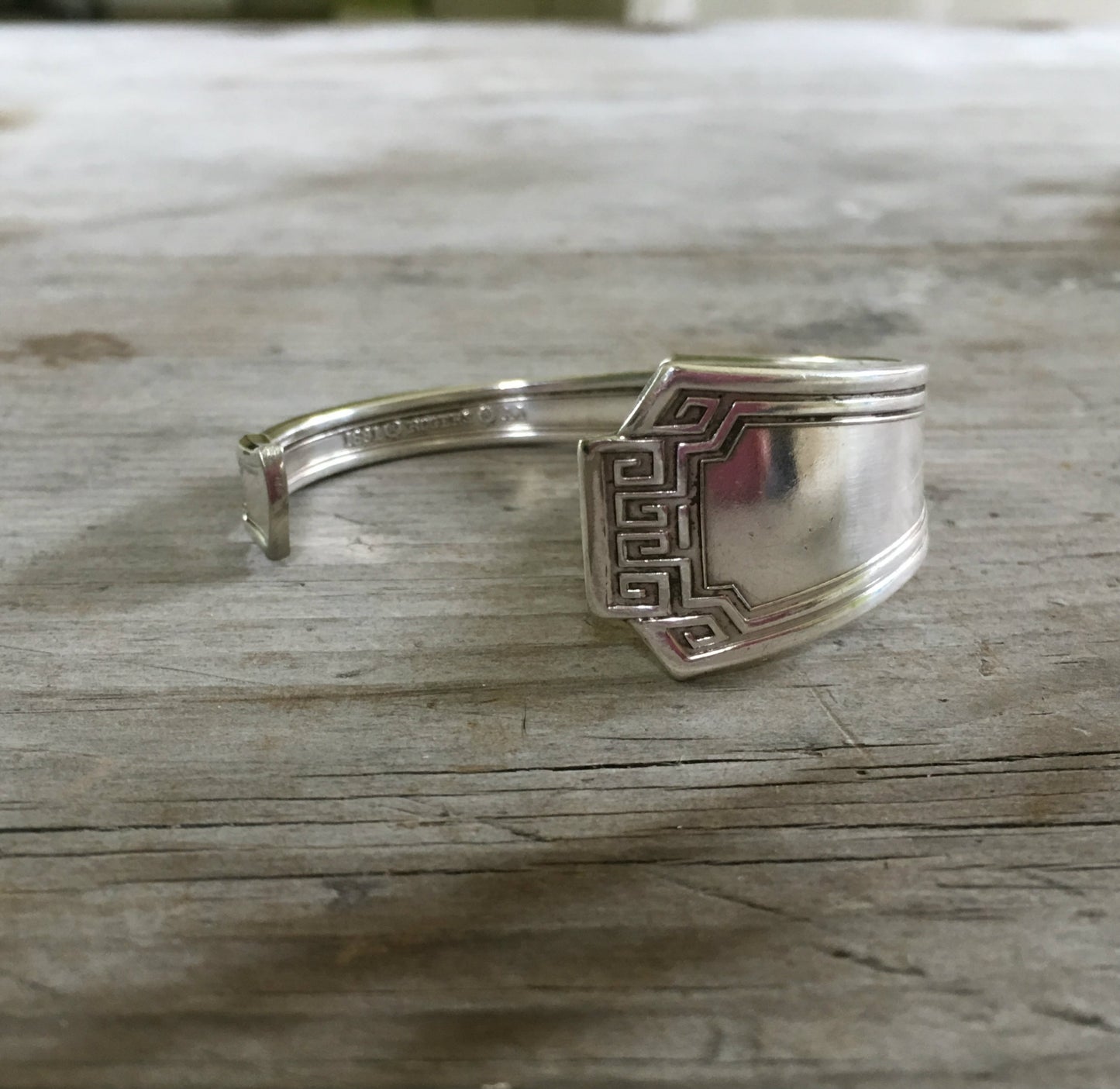 1881 Rogers Grecian pattern spoon cuff bracelet detailed view - handcrafted from upcycled vintage silverware - Laughing Frog Studio