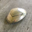 Artisan heart spoon belt buckle detail showing reclaimed silverware craftsmanship