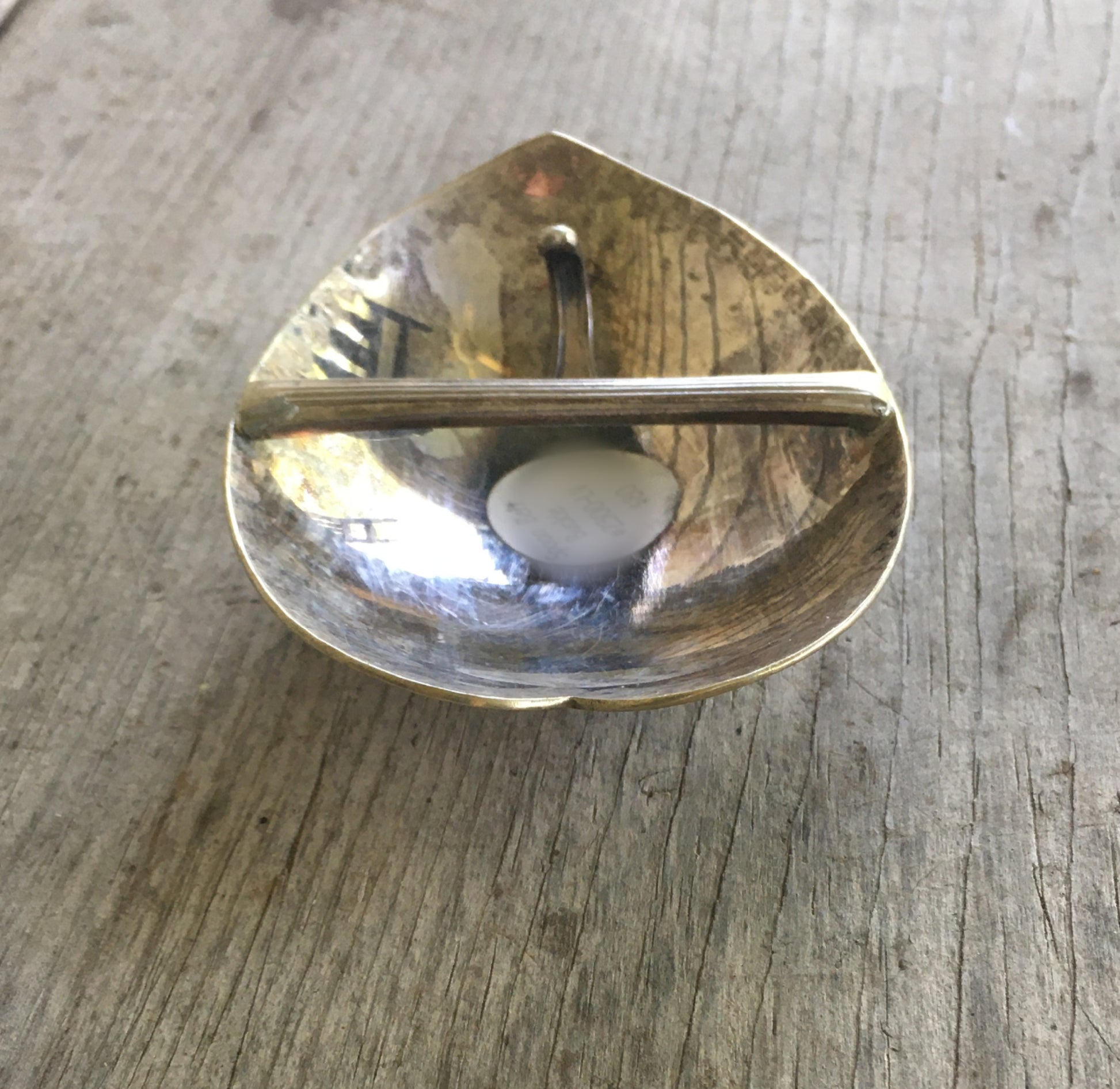 Back of heart spoon belt buckle showing snap belt attachment hardware