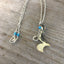 Spoon Artisan Necklace in the shape of a Quarter Rest and Eighth Note Musical Symbols Adroend with blue beads