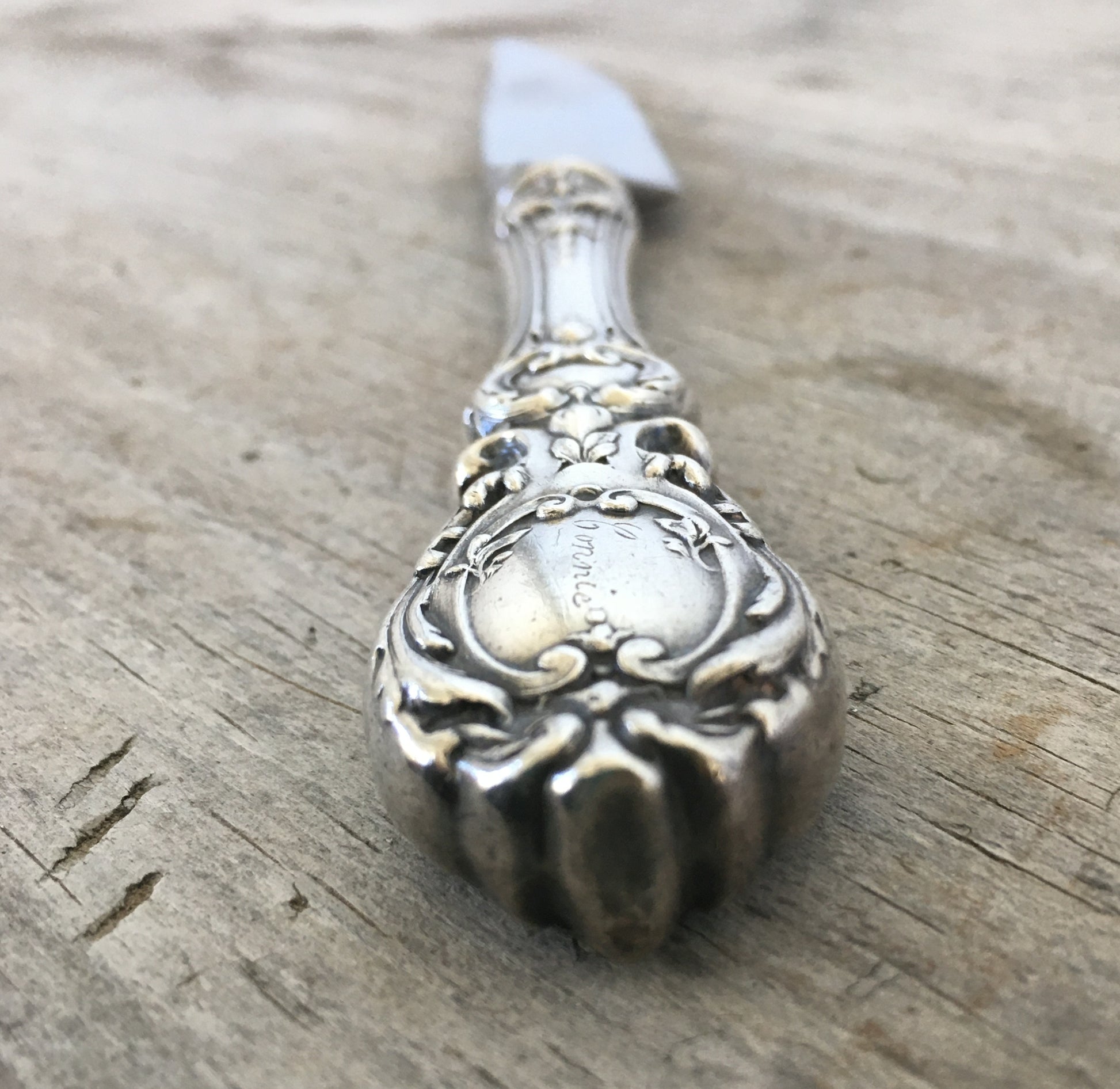 End view of Reed & Barton Francis I sterling silver charcuterie knife for meats and cheeses"